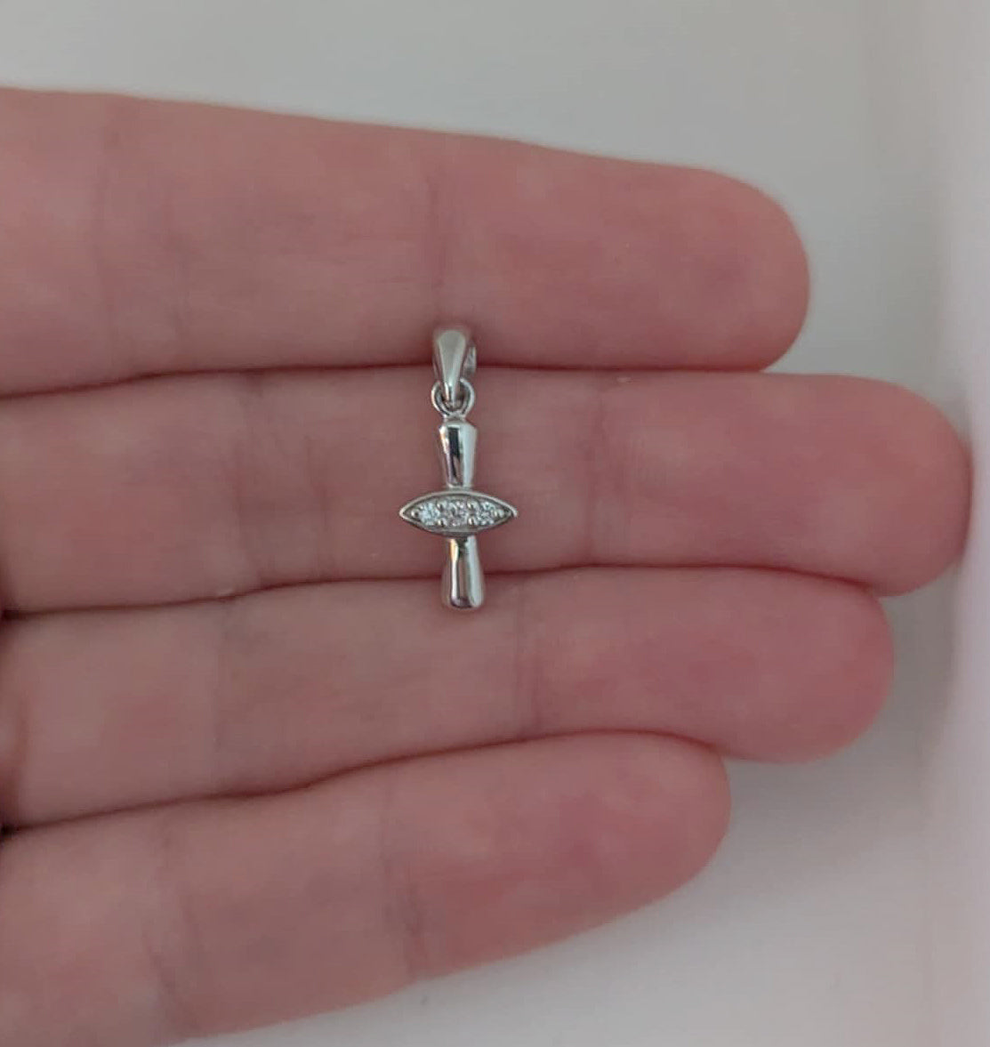 Highly Polished Sterling Silver Small Cross Pendant with Eye-Shaped Cubic Zirconia Center for Easter or Gift of Faith